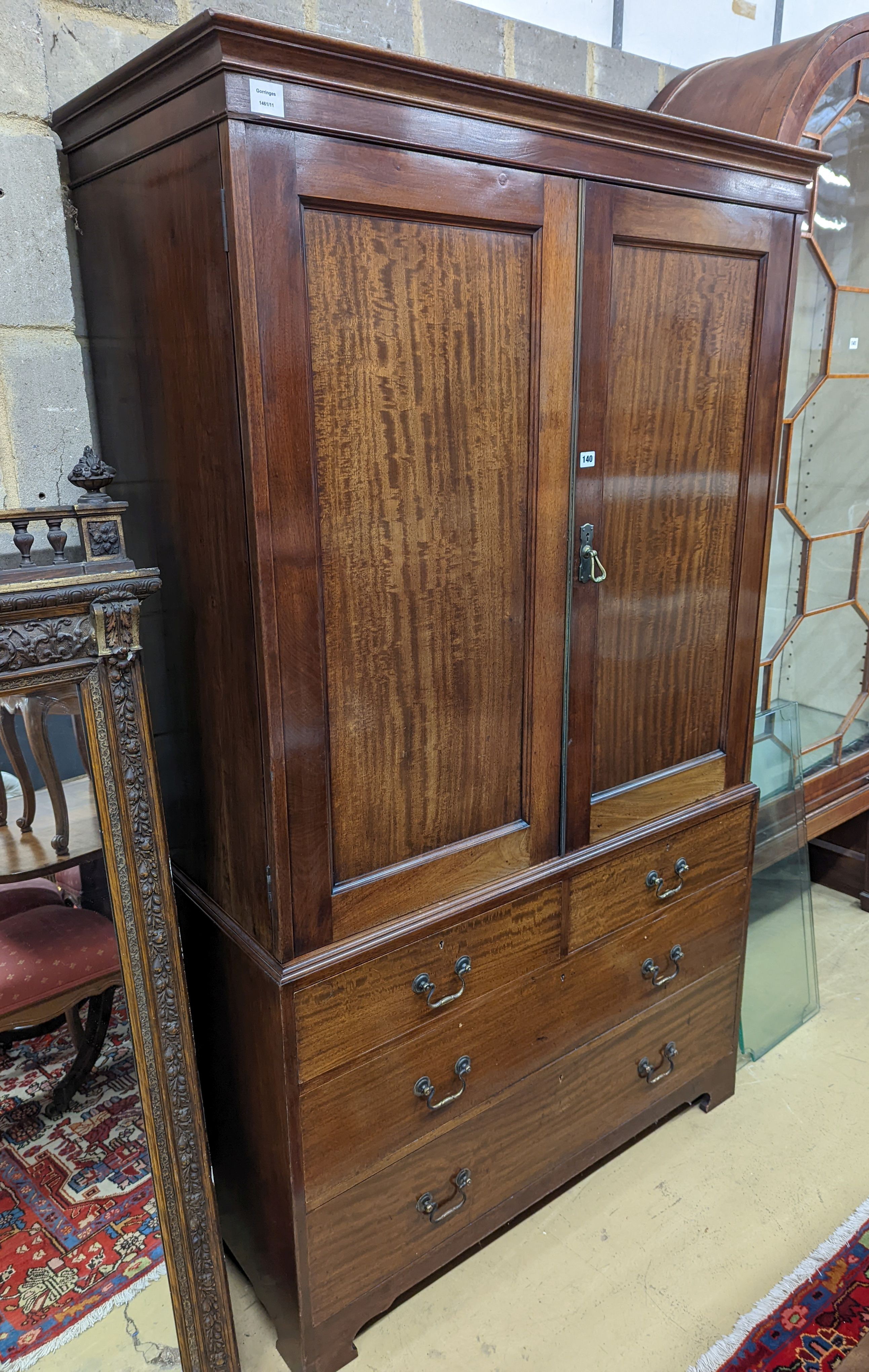 An early 20th century mahogany linen press, length 112cm, depth 56cm, height 109cm